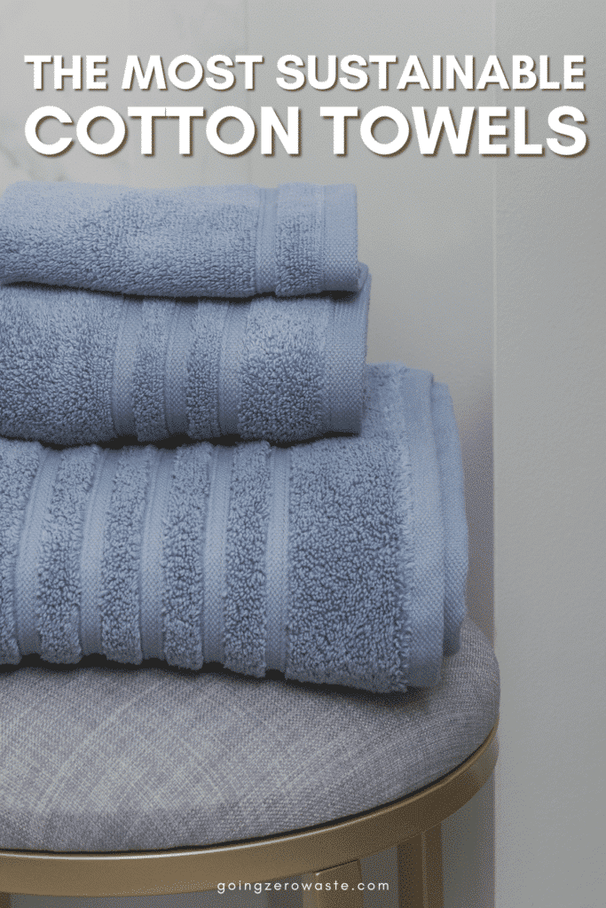 A stack of organic cotton towels with overlay text reading "the most sustainable cotton towels"